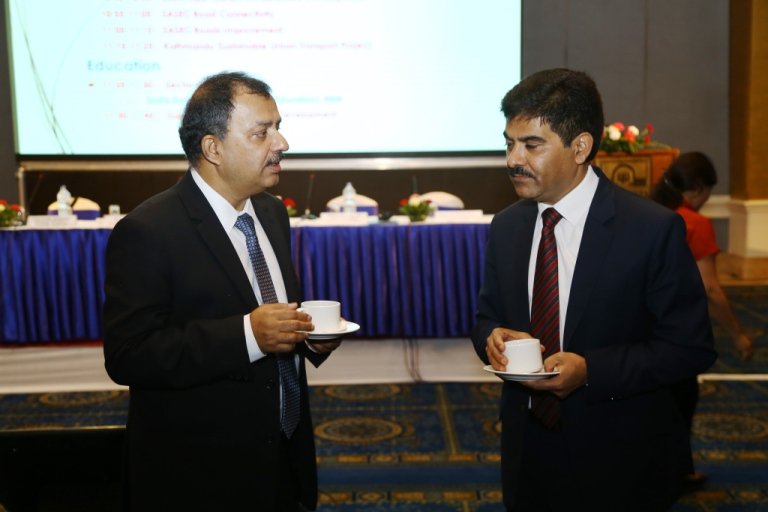 DDG Diwesh Sharan and Joint Secretary of Ministry of Finance Baikuntha Aryal meet informally before the TPRM begins.jpg