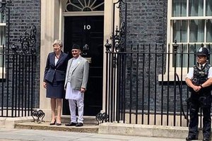 Oli with British PM.jpg