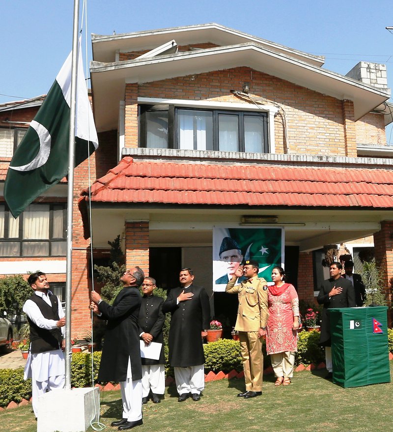 AMBASSADOR OF PAKISTAN HOISTING FLAG ON THE NATIONAL DAY OF PAKISTAN AT EMBASSY ON 23 MARCH 2018.jpg