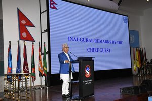 Chief Secretary Bairagi at Nepal Army seminar.JPG