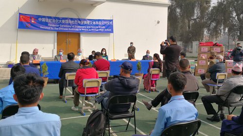 Chinese ambassador at book distribution.jpg