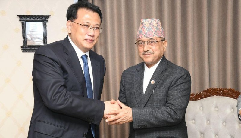 Chinese leader talk with DPM Khadka.jpg