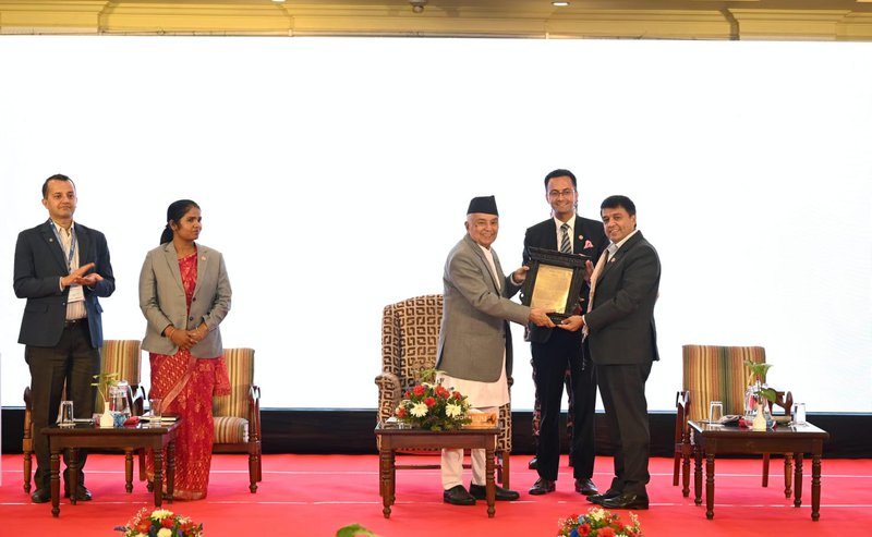 Dhakal awarded.jpg