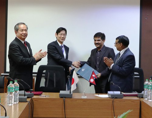 Grant Agreement exchanged between Mr. Baikuntha Aryal MOF and Mr. Jun Sakuma JICA.jpg