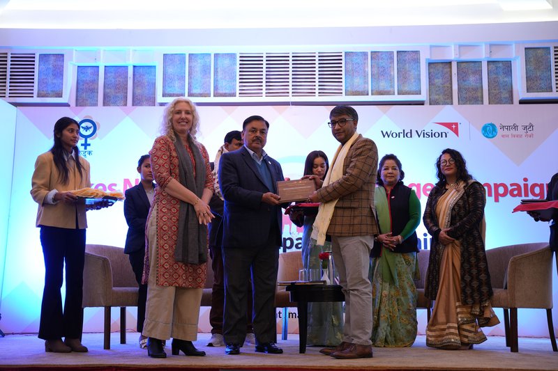 Hon. Minister Surendra Raj Acharya hands over a token of appreciation to the campaign&#x27;s strategic partners.jpg
