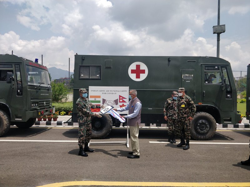 India hands over ambulances.jpg