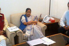 Industrialist Chaudhary Meets Indian Minister Swaraj