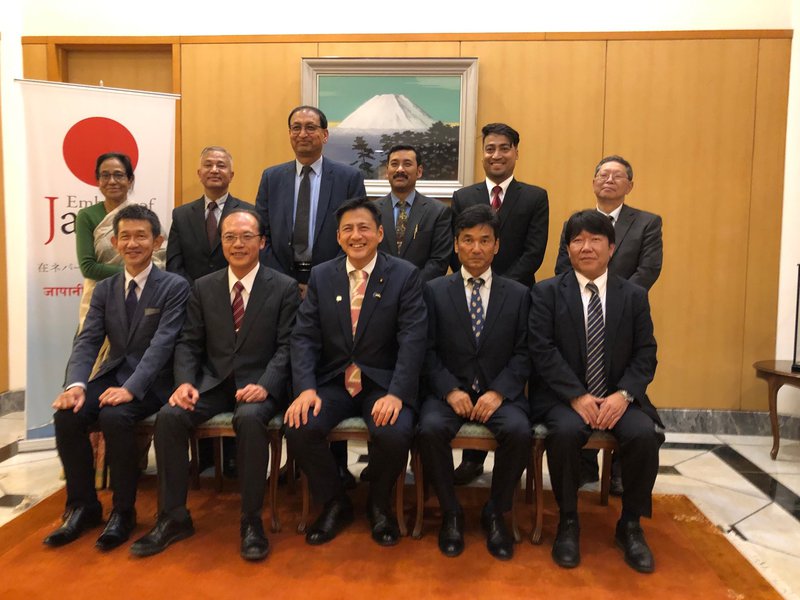 Japanese minister at meeting.jpg