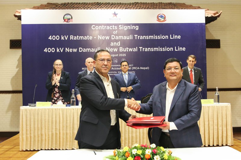MCA-Nepal ED exchanging the contract with WAIBA-SALASAR JV.jpg