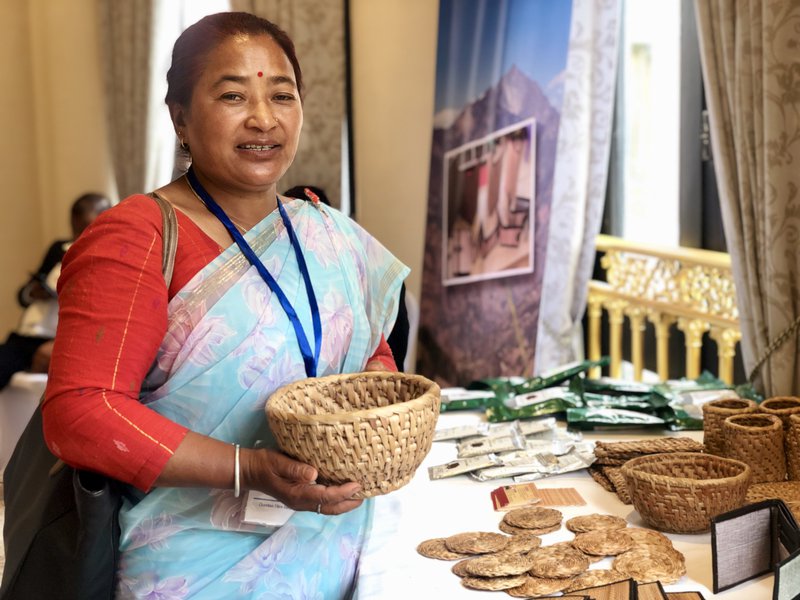 Maya Gurung, Large Cardamom Entrepreneur, with her cardamom fibre products.jpg