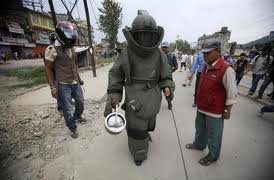 Nepal Army personal disposing explosive.jpg