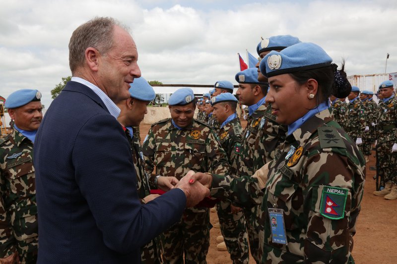 Nepalese peace Keepers in Sudan receiving award.jpg