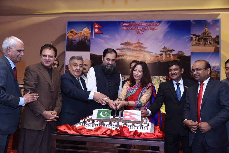 Nepali Embassy in Pakistan hosted reception Cake cutting.jpg