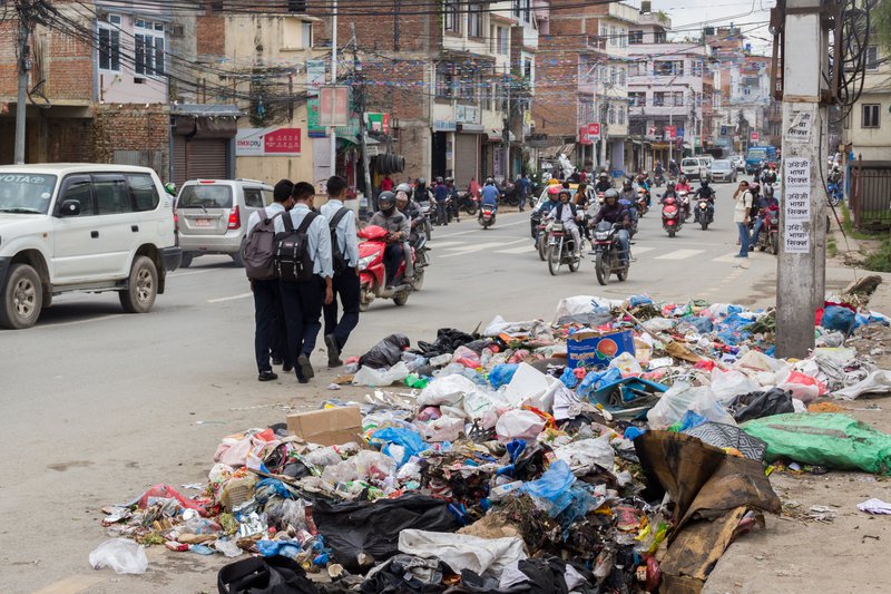Piles of dirt in a street of Kathmandu.jpg