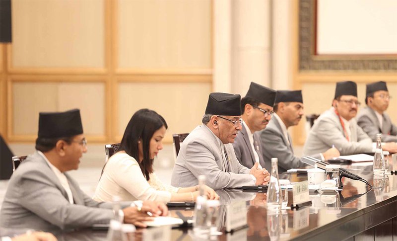 Prachanda in china delegation meeting.jpg