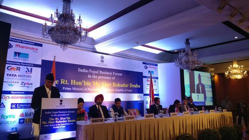 Prime Minister Deuba addressing business community in India.jpg