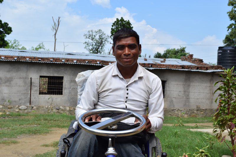 Ram Dayal with Tricycle.JPG