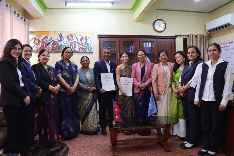 UN Women and National Women Commission team members with the signed MoU..JPG