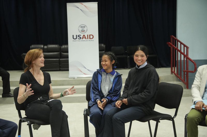 USAID Administrator in dialogue with shcool children.jpg