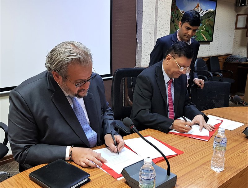 World Bank Country Manager for Nepal, Faris H. Hadad-Zervos, and Secretary, Lal Shanker Ghimire, signing agreement.jpg