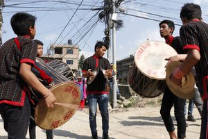 Youth of Bungamati playing dhime.JPG